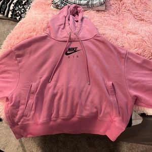 Pink Nike sweatshirt, slightly cropped but not much. In great condition